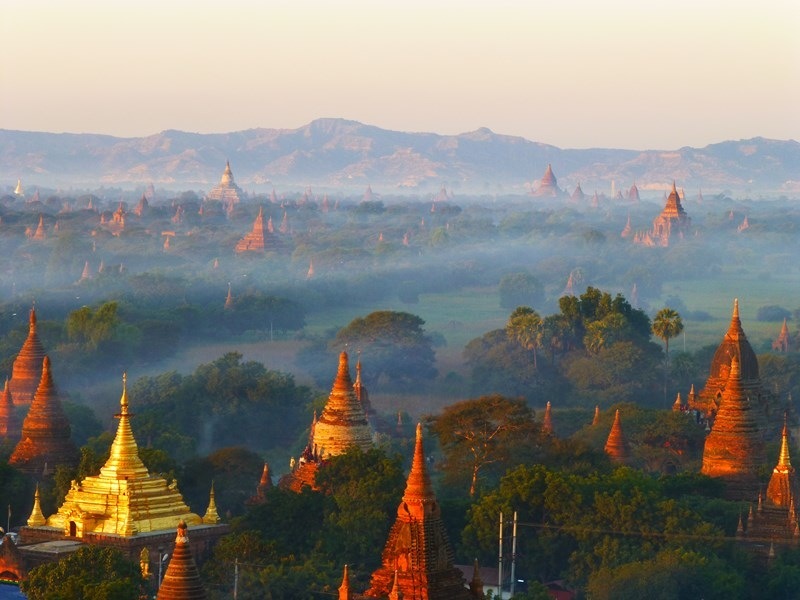 Early morning mist shrouds the many temples of Bagan in Myanmar