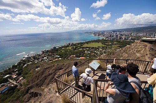 You have to pay a $1 fee to climb the 1.4 miles to the top of Diamond Head, but the view from the 750-foot summit is priceless.