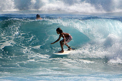 Poipu Beach is a great place for novice surfers.