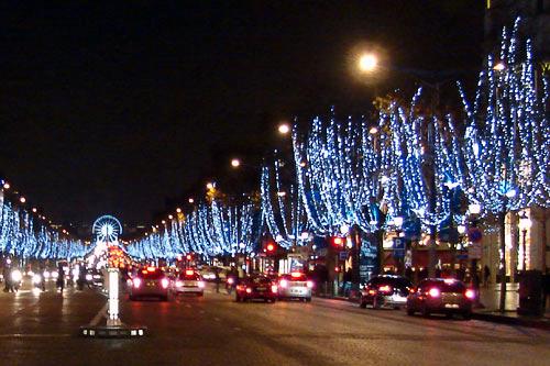 Festive holiday lights line the Champs-&Eacute;lys&eacute;es in Paris.