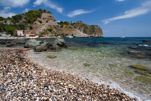 Beautiful pebble beach in Taormina, Sicily