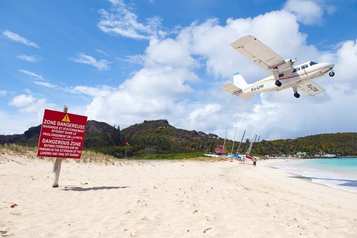 Plane ascending from St. Barts small airport.