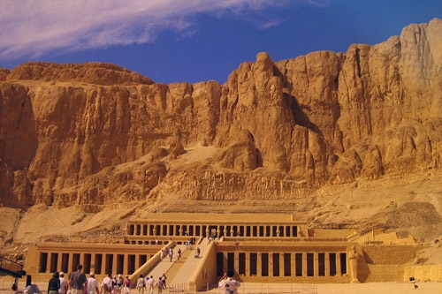 The Mortuary Temple of Queen Hatshepsut, situated beneath the cliffs at Deir el Bahari on the west bank of the Nile River .