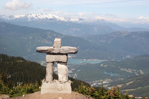 Top of mountain looking over Whistler Village and the 2010 Olympic Symbol, The Inukshuk. Photo by <a href="http://www.frommers.com/community/user_gallery_detail.html?plckPhotoID=2905a715-b284-4219-a938-38f68c21dade&plckGalleryID=c0482941-0d2d-4cca-b8c4-809ee9e20c72" target="_blank">Cheryl Lenheiser/Frommers.com Community</a>.