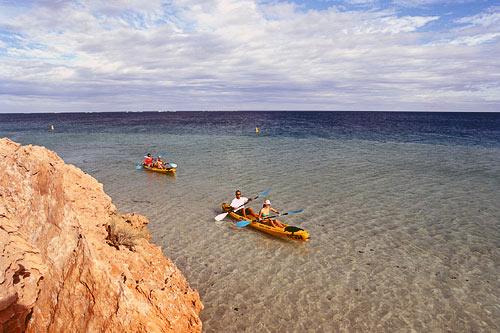 Kayaking in Ningaloo Marine Park along the coast of Western Australia. Courtesy Tourism Australia &copy; Photographer: Anson Smart.