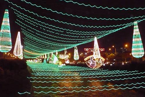 Holiday lights strung across the Rio Medellin, Colombia.